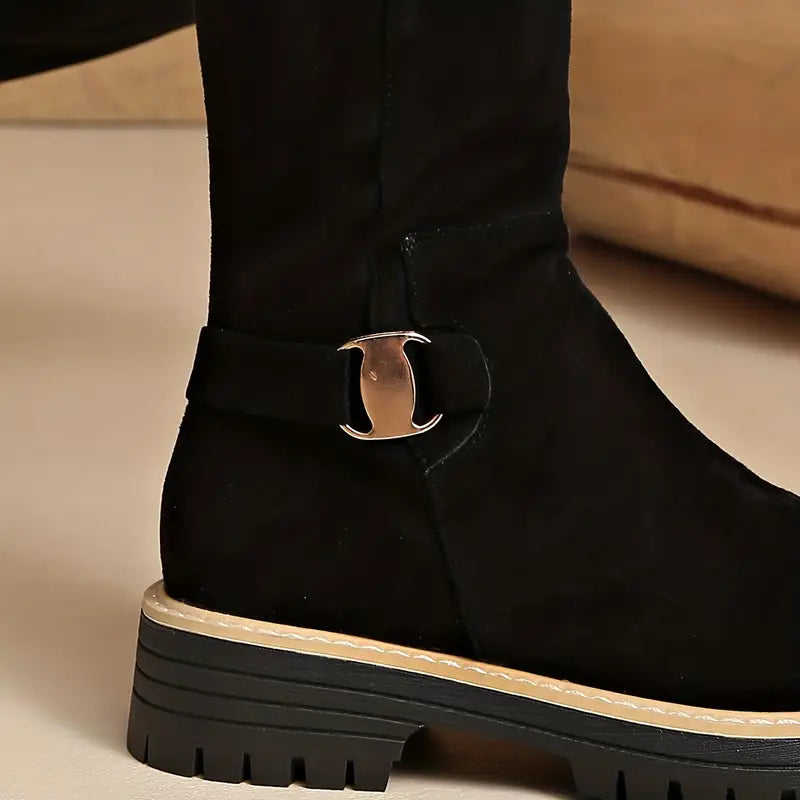High boots with a thick, non-slip sole.