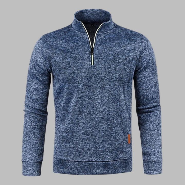 Blauwe heren sweater met halve rits, lange mouwen en opstaande kraag. Comfortabele pasvorm, ideaal voor casual en sportieve gelegenheden.