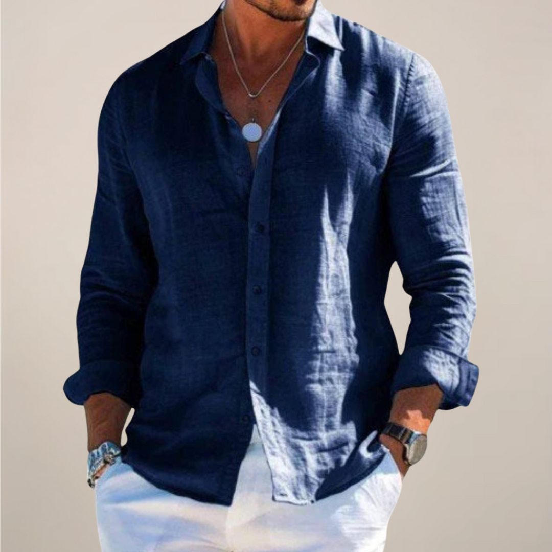 Relaxed-fit men's linen shirt with front button placket and long sleeves.