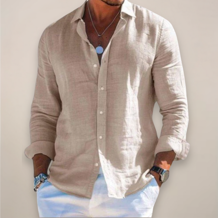 Relaxed-fit men's linen shirt with front button placket and long sleeves.