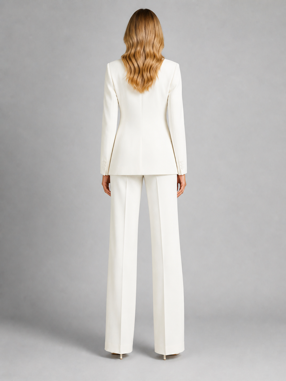 Two-piece women's set: women's blazer with tailored cut and wide-leg trousers