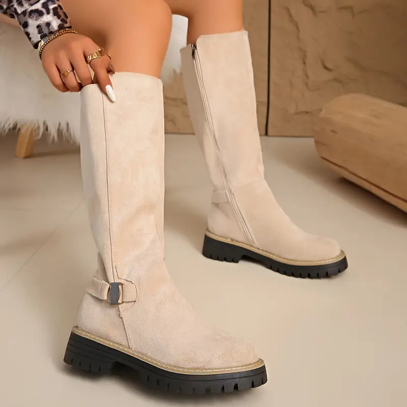 High boots with a thick, non-slip sole.