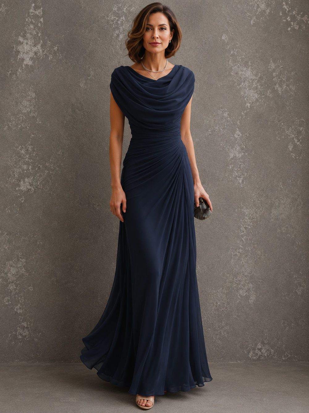 Draped sleeveless maxi dress with flowing floor-length skirt