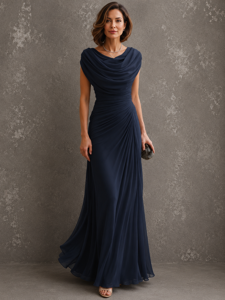 Draped sleeveless maxi dress with flowing floor-length skirt