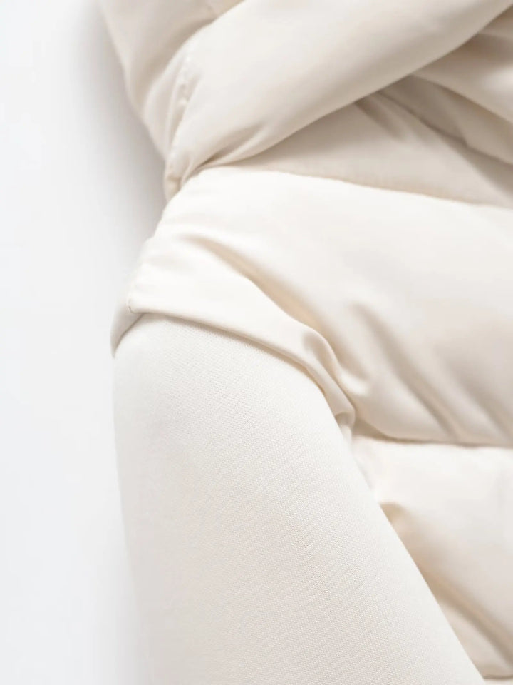 Lightweight Women's Quilted Winter Jacket with Hood and Hidden Pockets.