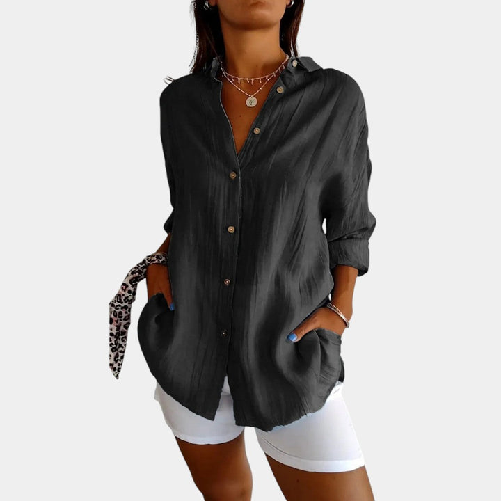 Damesblouse van luchtige katoen-linnenmix met comfortabele pasvorm, ideaal voor werk, vrije tijd of een avondje uit.